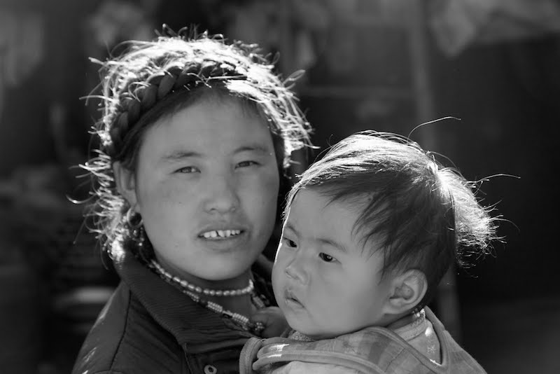 Local mother and kid in Tsum valley area - Manaslu Tusm valley trekking 