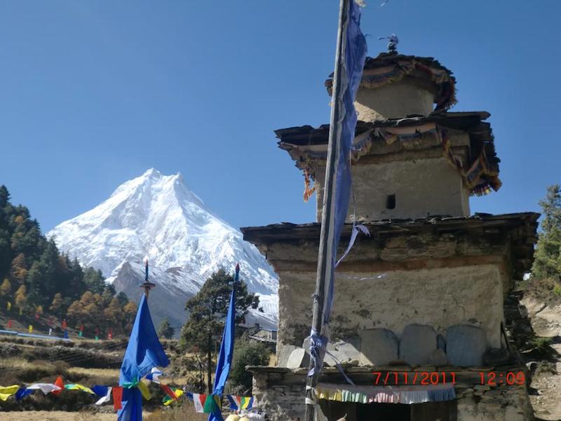 Stupa and Mt. Manaslu on back ground Manaslu circuit trekking